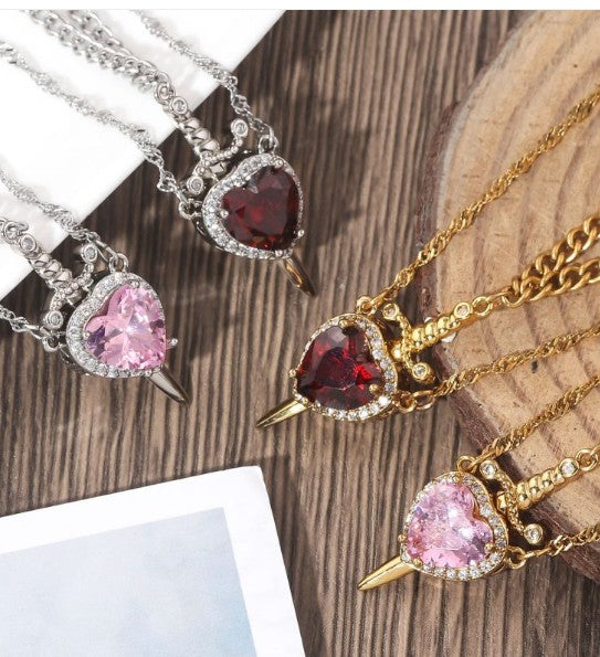 Love Dagger Couple Necklace — Heart Piercing Pendant Set for Two